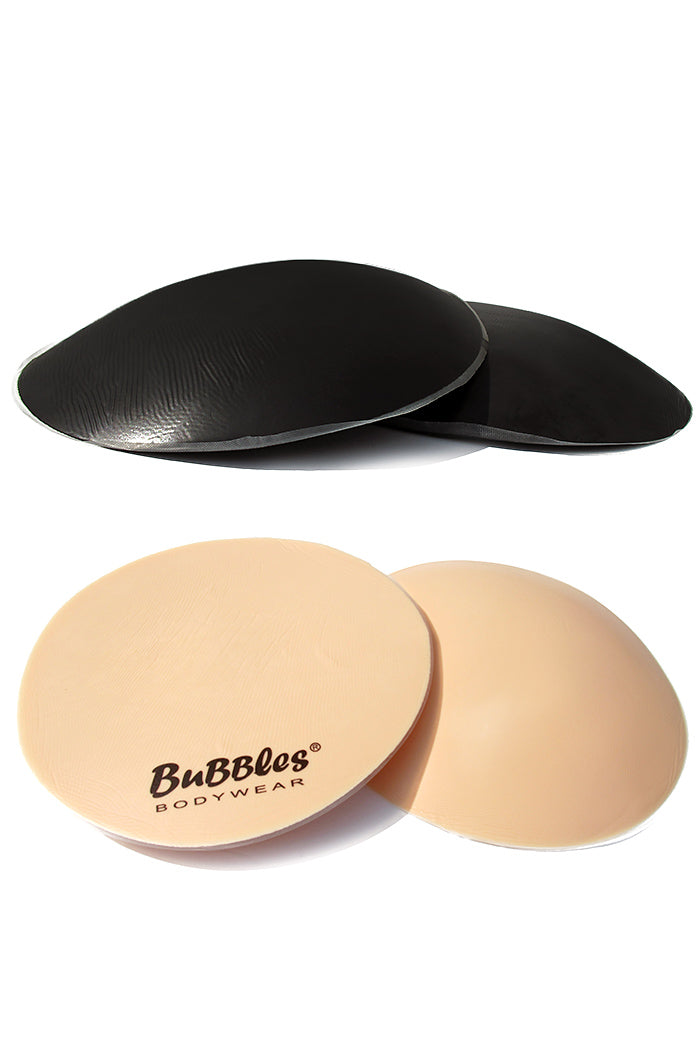 Air-infused silicone butt pads in black and nude colors, offering lightweight and realistic enhancement.
