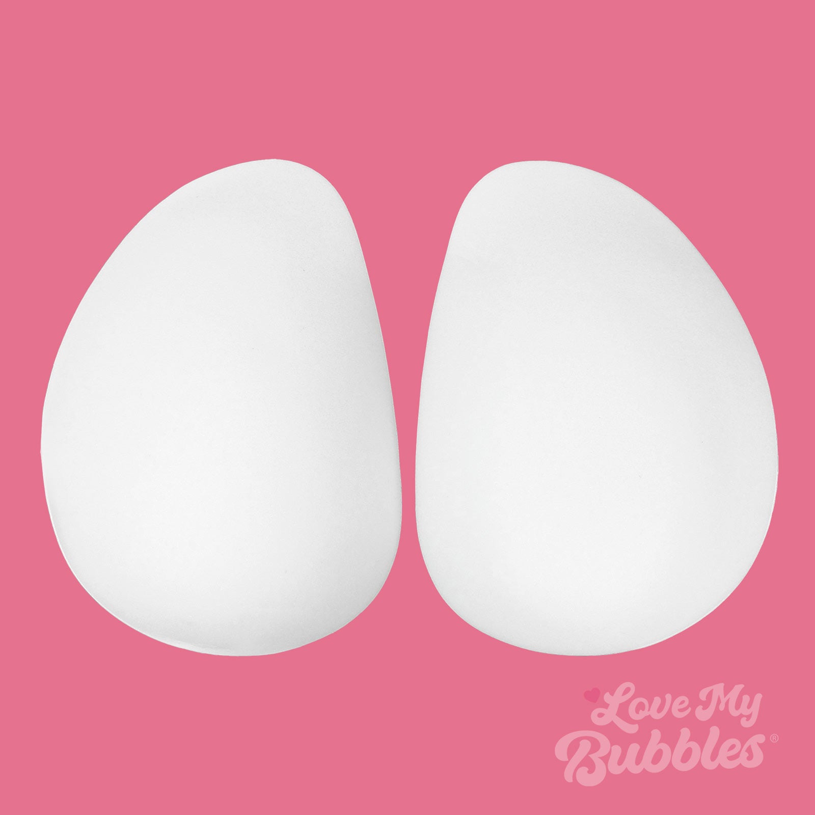 Butt Pads, can also be used as Hip Pads, in Oblong shape, white and thick flat view on pink background.
