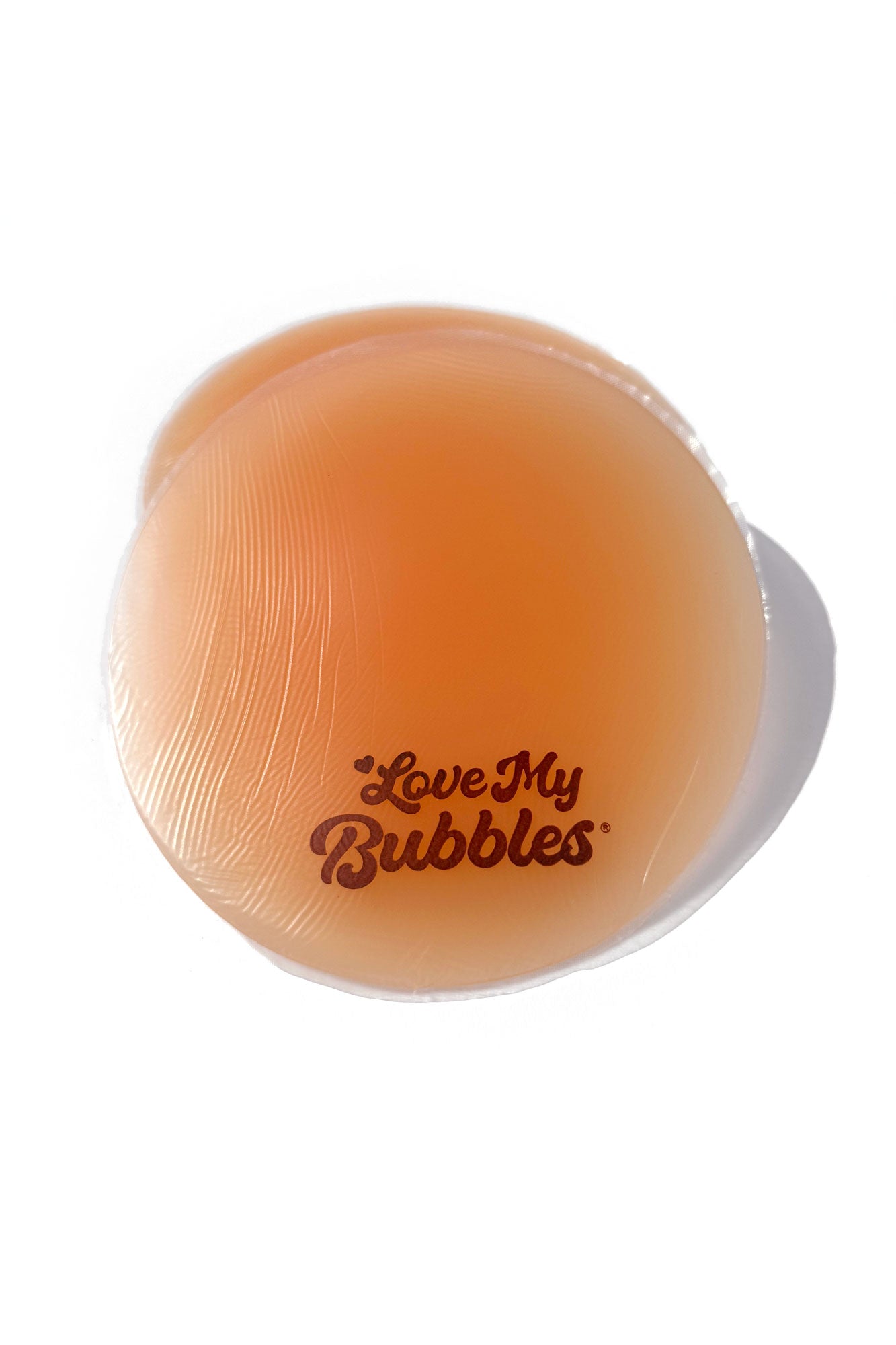 Silicone Butt Pads in a peach hue labeled 'Love My Bubbles', providing a realistic and authentic feel.