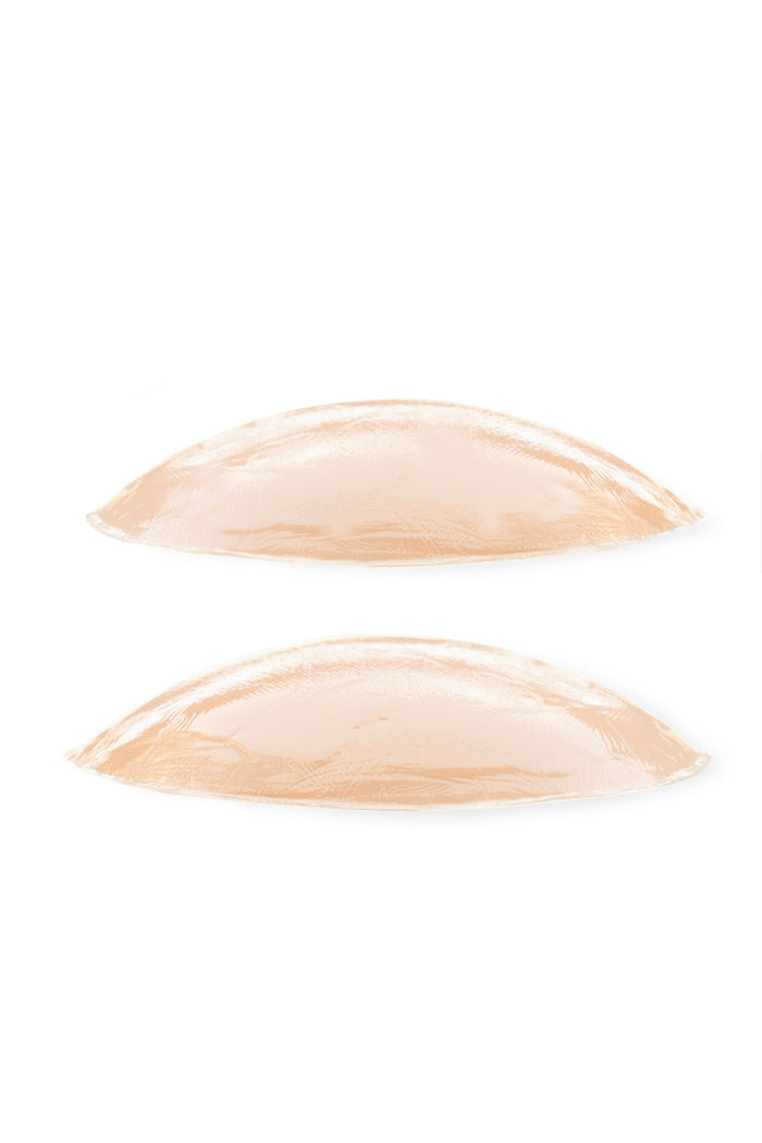 Sticky Buns Silicone Adhesive Butt Pads for enhancing shape and size in underwear and snug fitting pants.