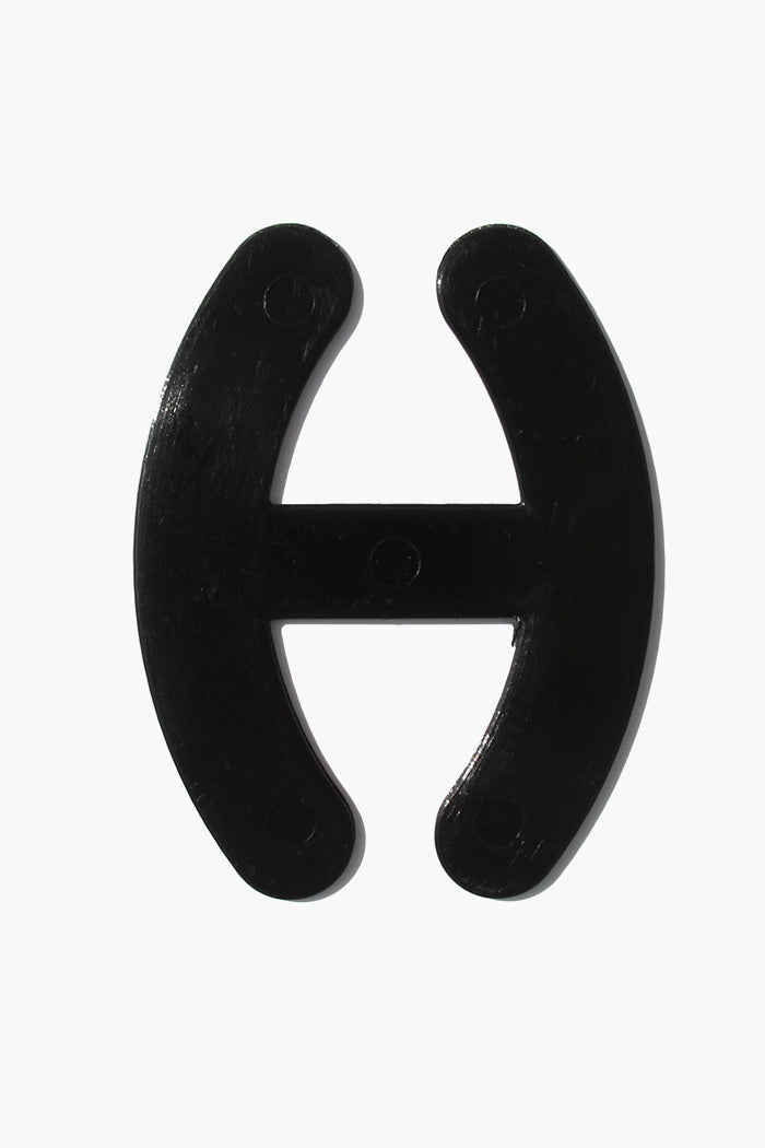 Bra Strap Adjuster plastic hook for bra strap management in black.