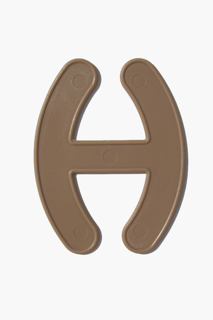 Bra Strap Adjuster plastic hook for bra straps management in tan.