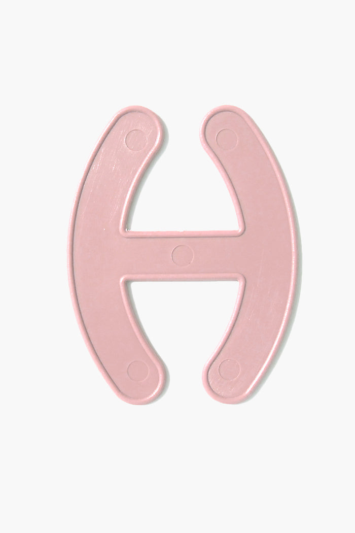 Bra Strap Adjuster plastic hook for bra strap management in pink.