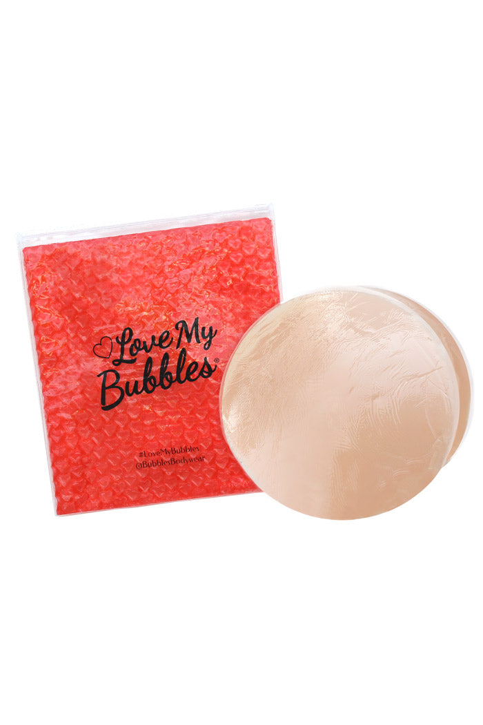 Silicone adhesive butt pads pictured with free storage bag