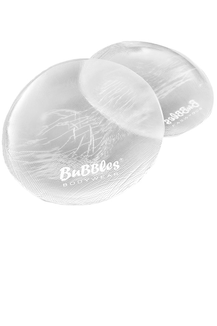 Silicone Butt Pads in clear on a white background with Bubbles Bodywear logo.