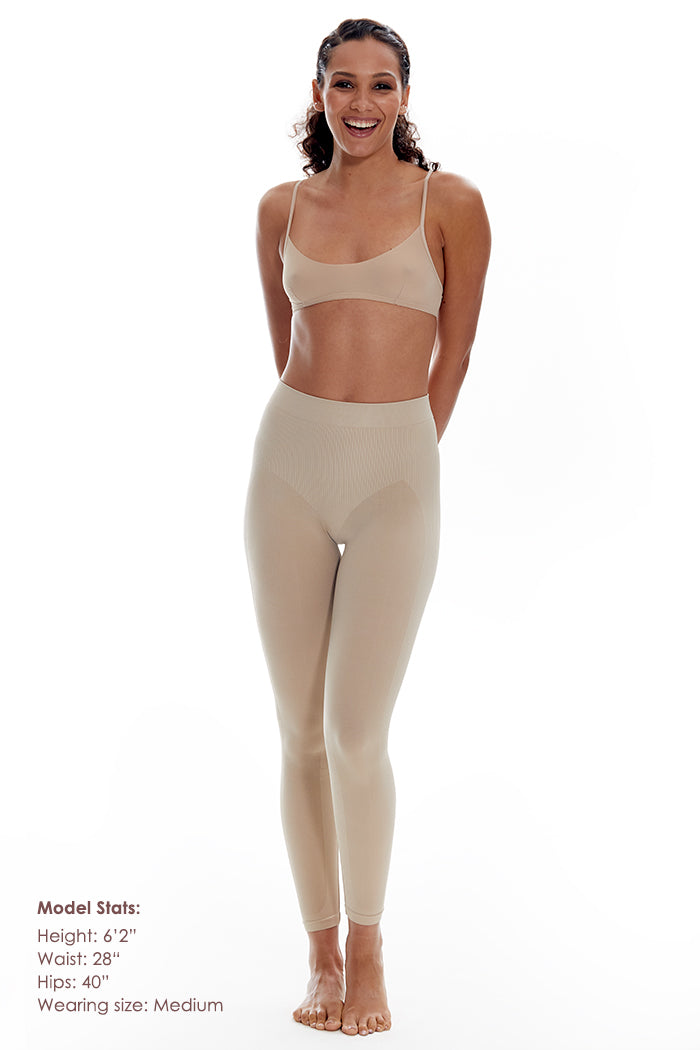 Seamless sculpting boty-lift leggings - front view on tall model