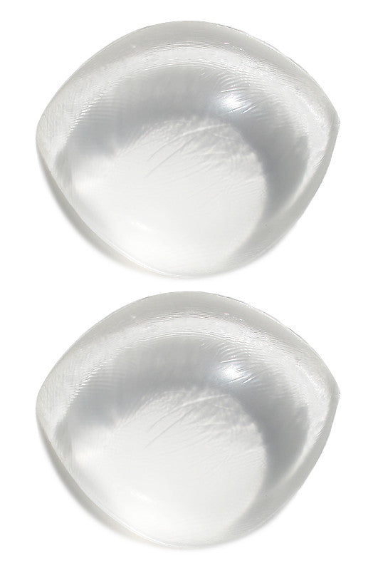 Close-up of a pair of clear round bra pads swim and bra inserts chicken cutlets